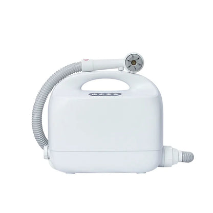 White handheld shower device with hose on a white background